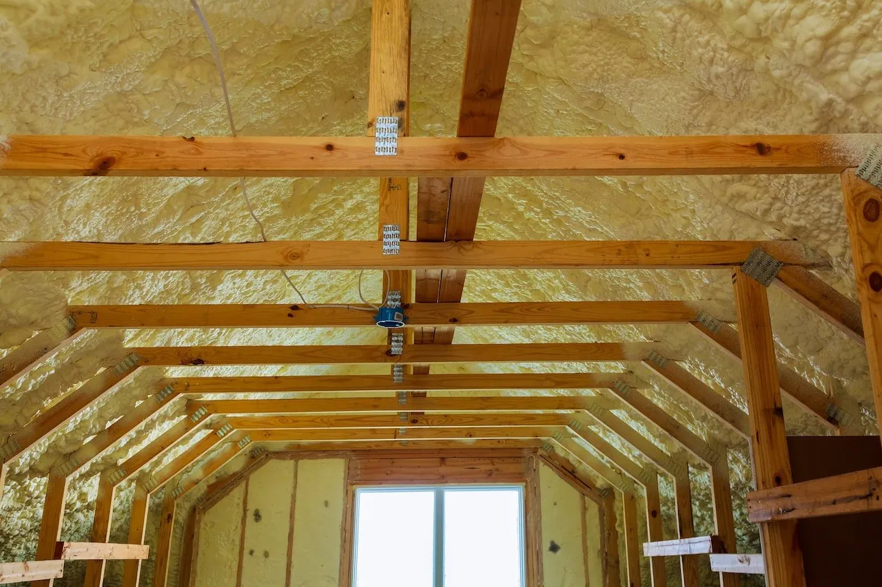 Insulation work in an open framing assembly